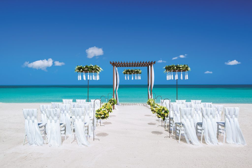 beachfront ceremony setup with simple yet elegant features