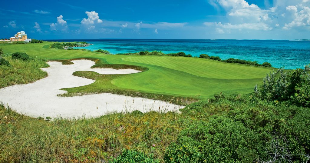 A hole on the golf course hugging the coastline