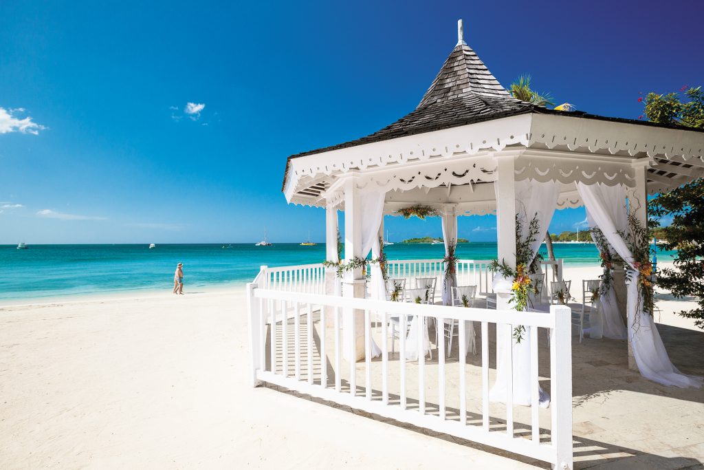 Beachfront wedding gazebo makes for a breathtaking backdrop.